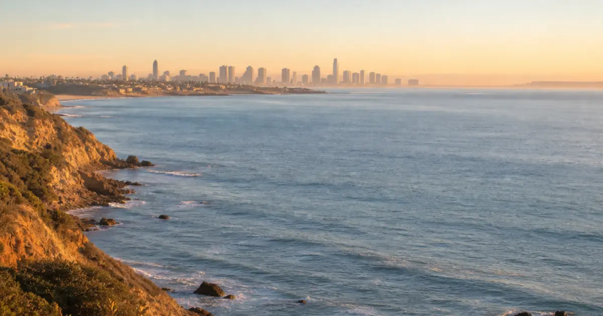 California coastline and city skyline representing statewide opioid treatment access