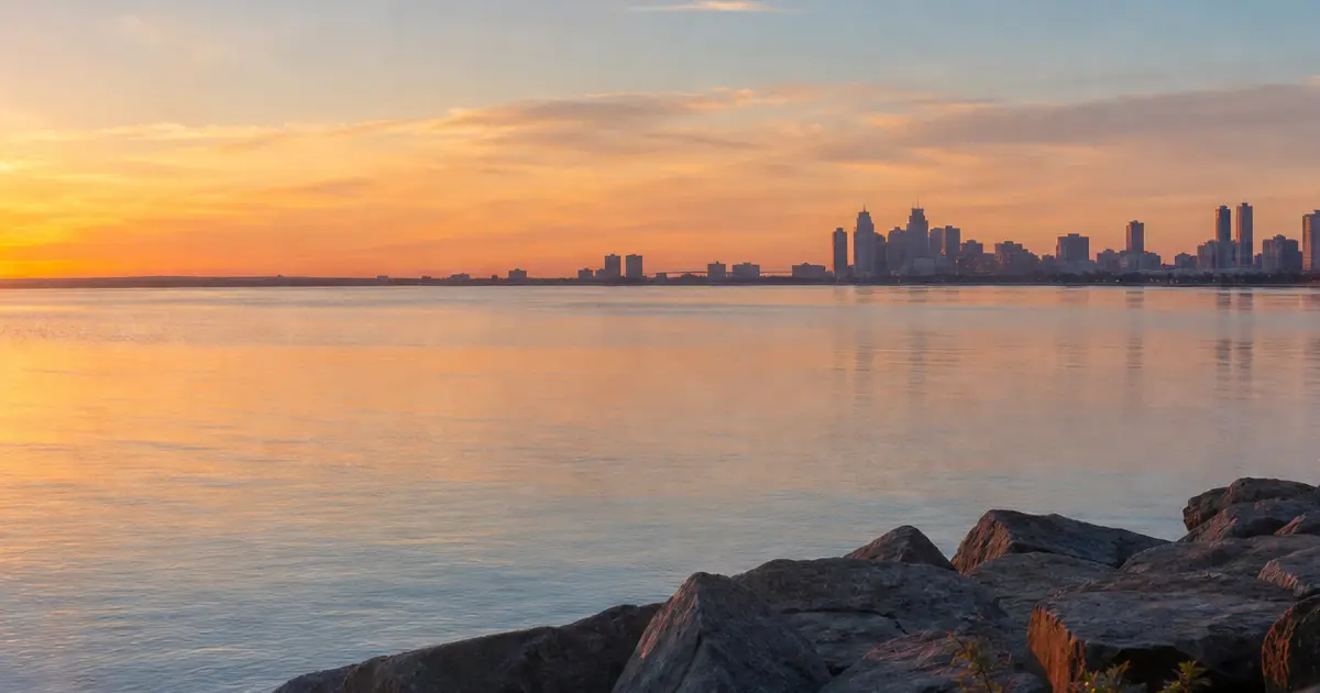 Great Lakes shoreline and Michigan city skyline representing opioid treatment access statewide