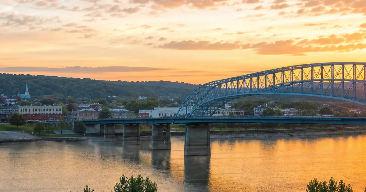 Ohio river town and bridge representing the state's recovery from the opioid epidemic