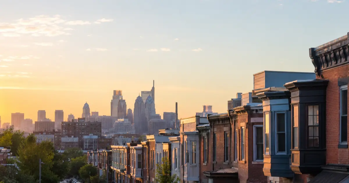 Pennsylvania city rowhouses and skyline representing opioid treatment access across the state
